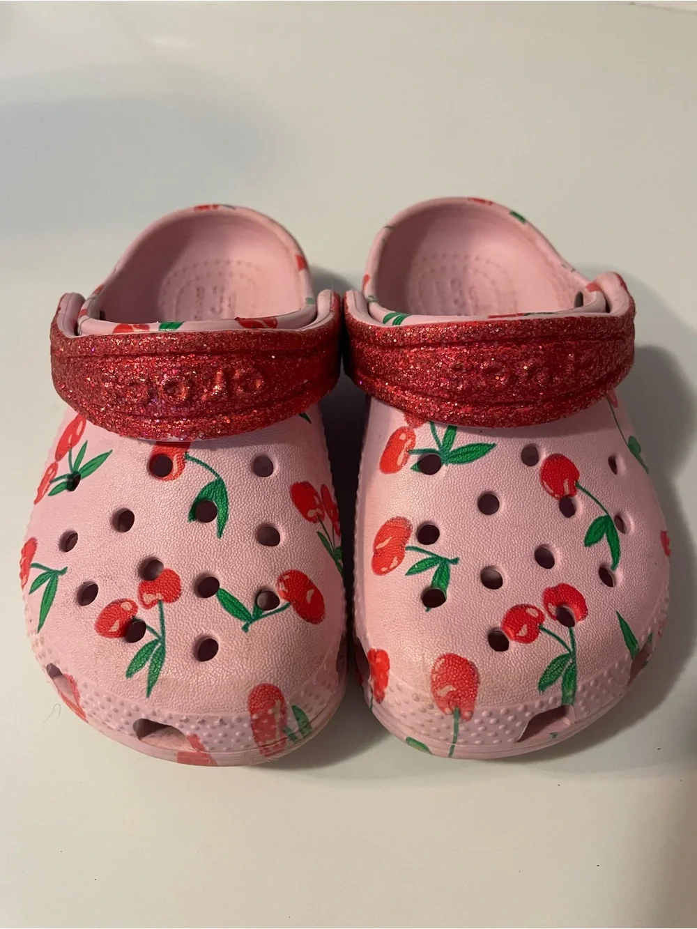 CROCS Kids Pink Clogs with Red Cherry Print and Red Glitter Strap